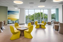 At the Sarasota Memorial Hospital’s Cornell Behavioral Health Pavilion, glass partitions around staff and social spaces allow light further into the building while also enhancing sightlines. At the Sarasota Memorial Hospital’s Cornell Behavioral Health Pavilion, glass partitions around staff and social spaces allow light further into the building while also enhancing sightlines.