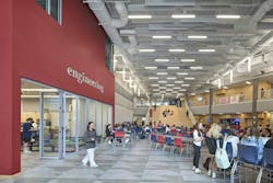 The commons area serves as a learning commons and dining space. The hub branches off to various classrooms at New Fairfield High School in New Fairfield, Connecticut. The commons area serves as a learning commons and dining space. The hub branches off to various classrooms at New Fairfield High School in New Fairfield, Connecticut.