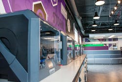 Makerspace with 3D printers and soft seating for a sensory-friendly area. Makerspace with 3D printers and soft seating for a sensory-friendly area.