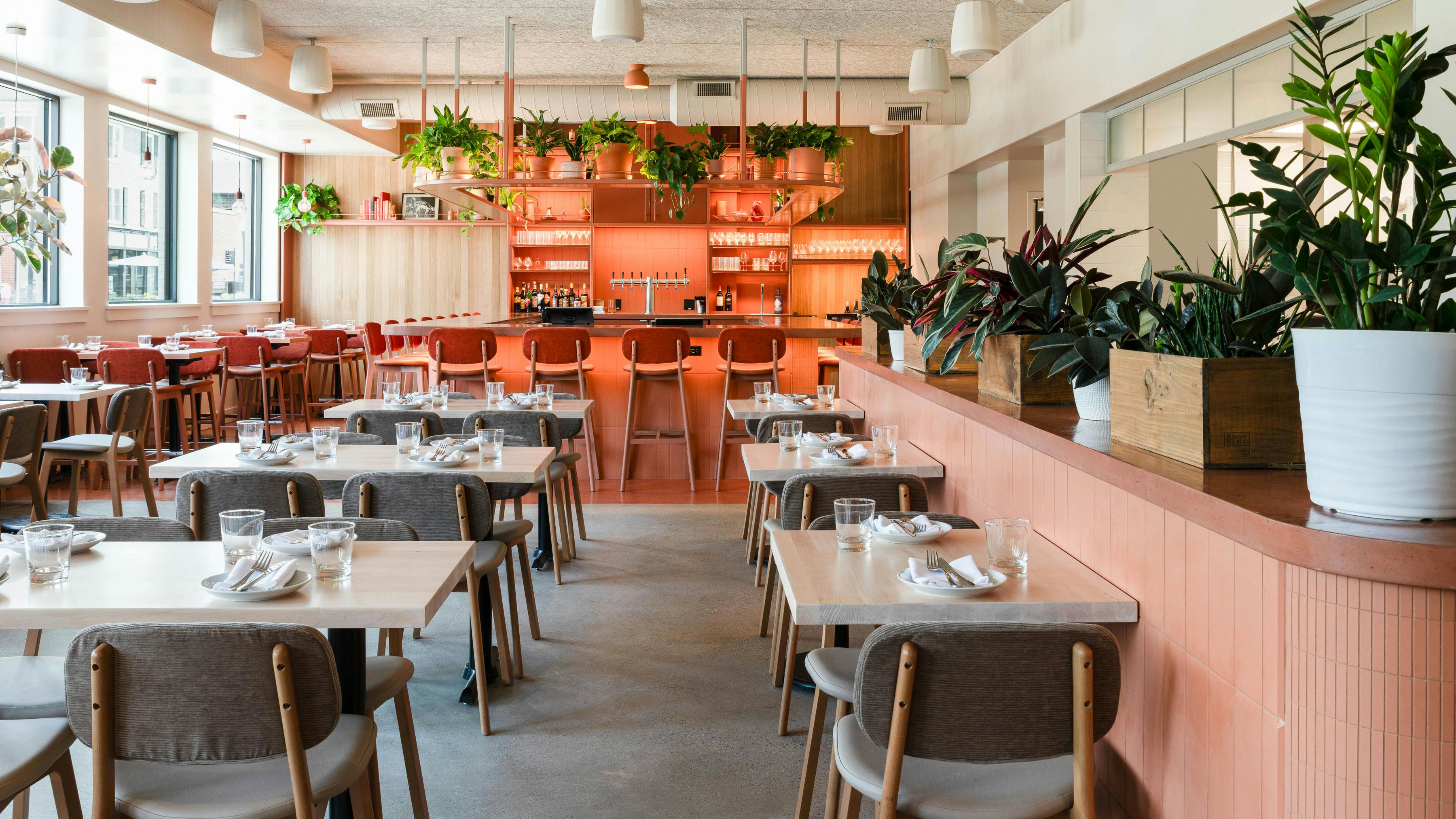 RODE's design team modernized a local neighborhood eatery with color blocking in terracotta, cream, and blue to echo the vibrant Italian dining experience at Gufo Restaurant.