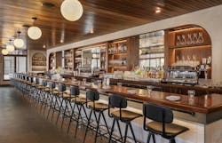 For Bar Volpe, designers were able to repurpose design elements from the previous restaurant tenant, such as the polished concrete floor, banquettes, and wooden chairs, and elevate them with Southern Italian accents like Venetian plaster, glazed ceramic tile, and marble bar tops. For Bar Volpe, designers were able to repurpose design elements from the previous restaurant tenant, such as the polished concrete floor, banquettes, and wooden chairs, and elevate them with Southern Italian accents like Venetian plaster, glazed ceramic tile, and marble bar tops.