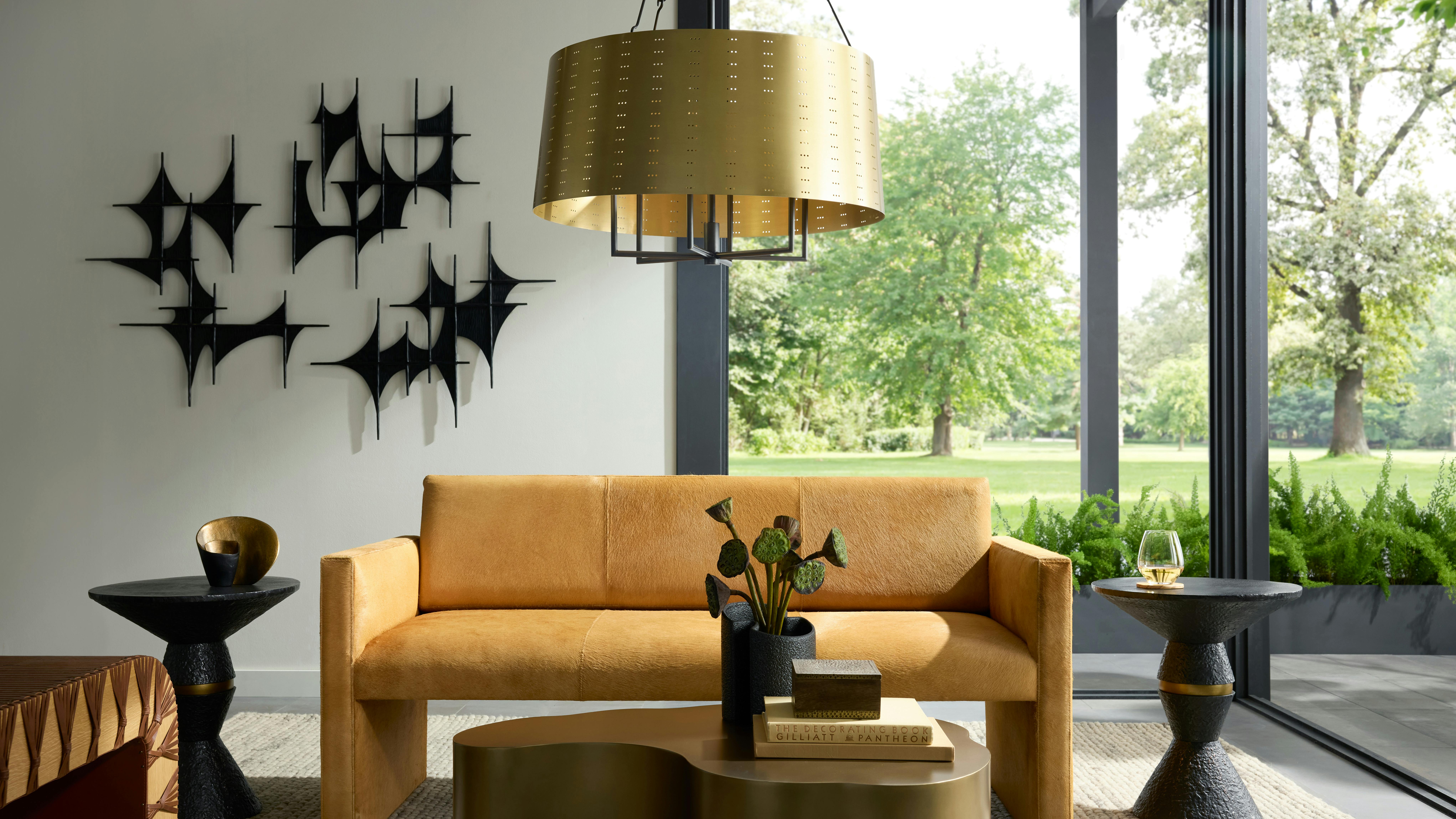 The Freya Wall Plaques are hand-crafted from black-forged iron with a gold leaf finish.