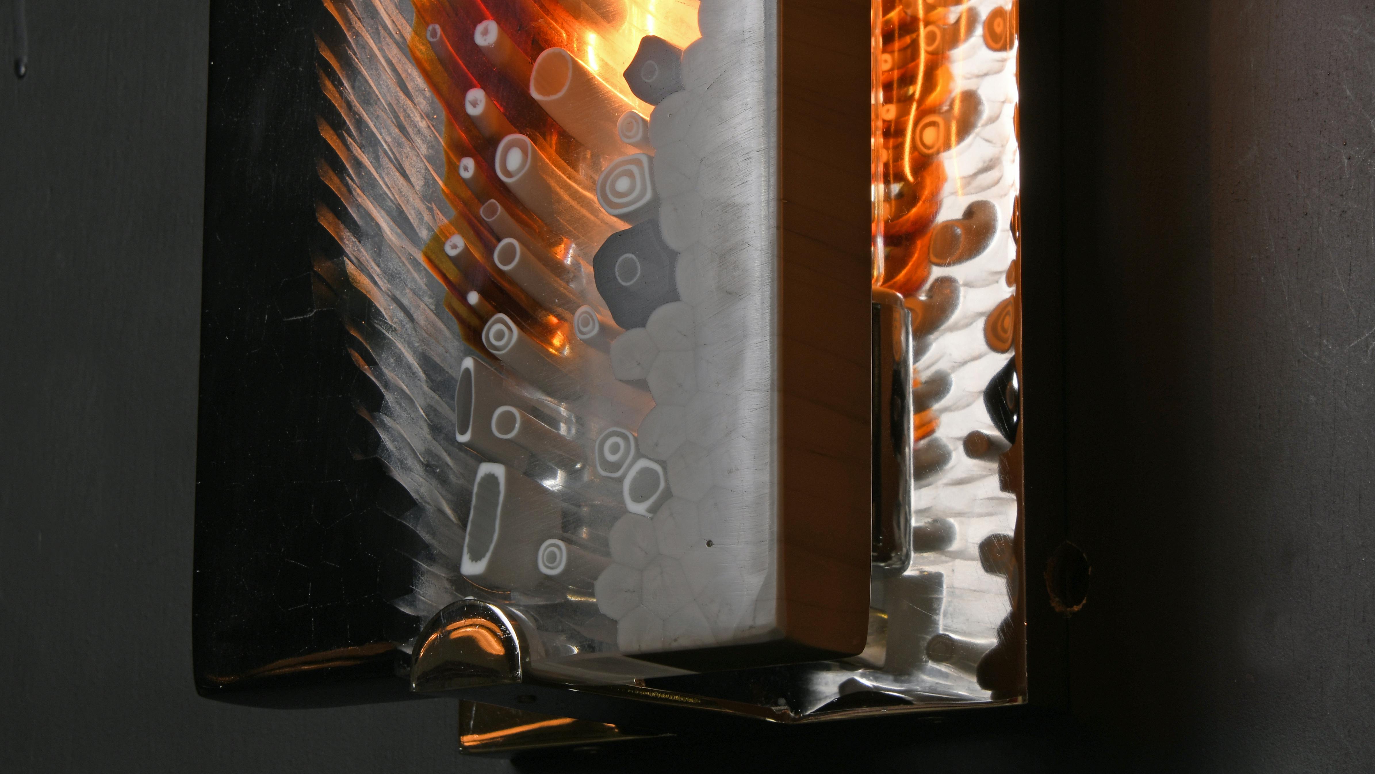 Fonda Rosso light features various colored slabs of glass.