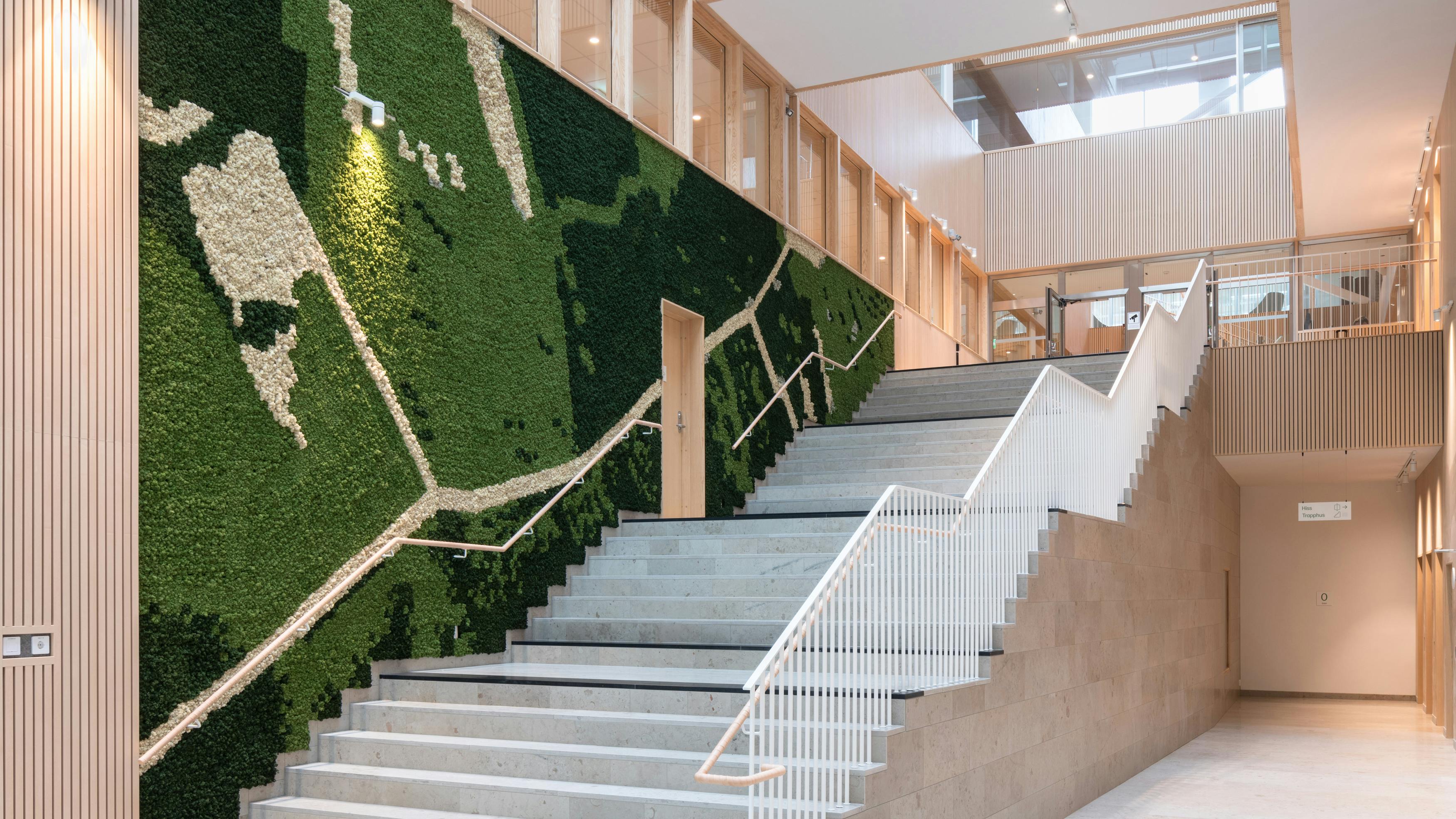 Pixel is a naturally acoustic wall system adding biophilic colors and textures to a staircase.