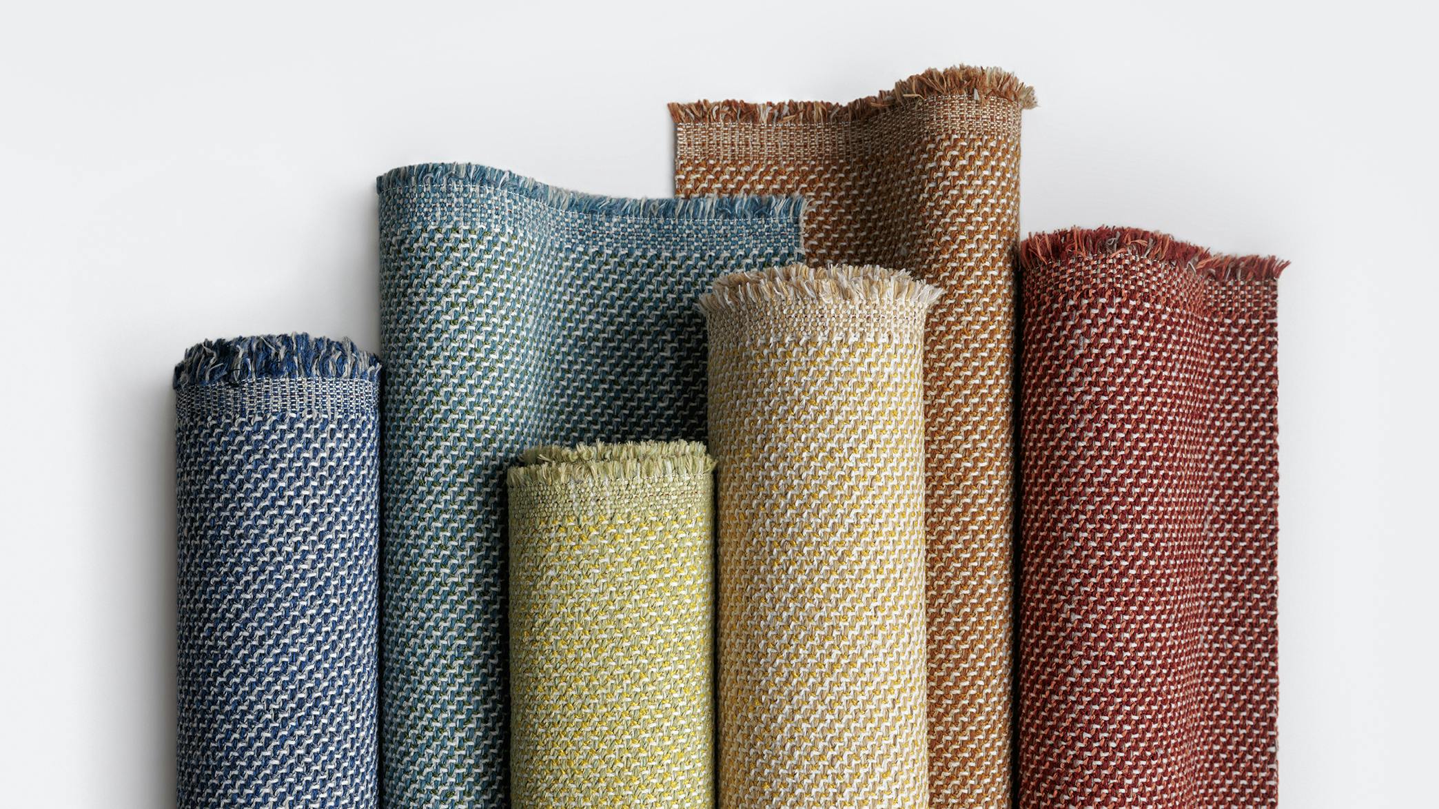 Luum Textiles' Trichroma fabric is a multicolor, highly dimensional twill structure that runs diagonally.
