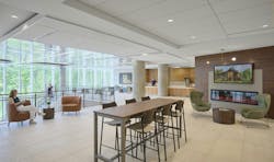 Lounge/waiting area with bar-height table and chairs, lounge chairs by a fireplace, and views to the outdoors. Lounge/waiting area with bar-height table and chairs, lounge chairs by a fireplace, and views to the outdoors.