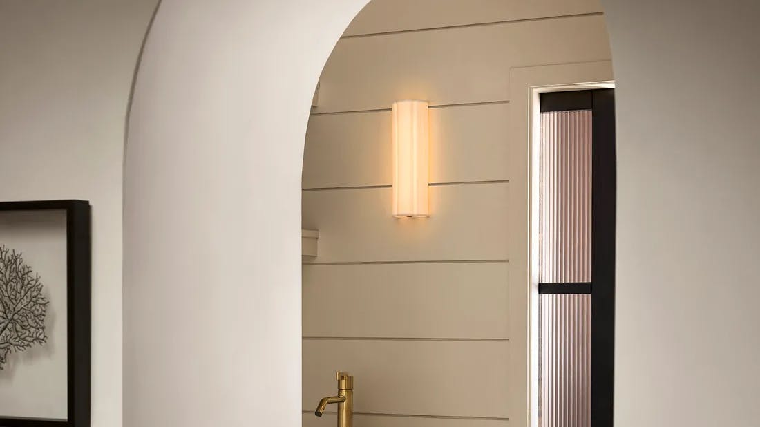 The Blossom Linear Wall Light is a permanent alternative to its portable table lamp.