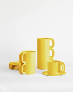 Heller Max 2 cups and saucers in yellow. Heller Max 2 cups and saucers in yellow.