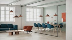 The Sierra Acoustic Pendant is suspended from the ceiling above a dining table and gathering area. The Sierra Acoustic Pendant is suspended from the ceiling above a dining table and gathering area.