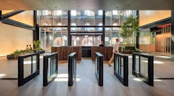 Atrium Lobby of The Refinery at Domino fills with natural light from arched windows Atrium Lobby of The Refinery at Domino fills with natural light from arched windows