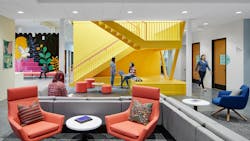 Perkins&Will Interior Design at Family Tree Clinic shows a brightly accented waiting area with grounding neutrals and a vibrant yellow stairwell. Perkins&Will Interior Design at Family Tree Clinic shows a brightly accented waiting area with grounding neutrals and a vibrant yellow stairwell.