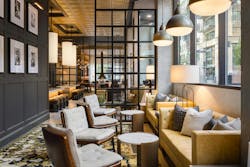 Old-world slump glass delineates the areas between the co-working space, entertaining kitchen, and lounge on Midland Lofts’ ground floor. Old-world slump glass delineates the areas between the co-working space, entertaining kitchen, and lounge on Midland Lofts’ ground floor.