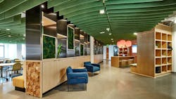 Acoustic ceiling baffles in green accentuate the lighter wood tones and mimic the greenery while minimizing sound disturbances at The Abbott, a new workspace located at 20 Brattle Street, Cambridge, Mass. Acoustic ceiling baffles in green accentuate the lighter wood tones and mimic the greenery while minimizing sound disturbances at The Abbott, a new workspace located at 20 Brattle Street, Cambridge, Mass.