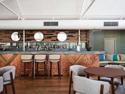 Patrons at Arnguli Bar and Grill on Ayers Rock Resort are treated to a glimmering bar counter, created as a focal point by A+ Design Group with Chemetal Canterbury 315 surfacing. Patrons at Arnguli Bar and Grill on Ayers Rock Resort are treated to a glimmering bar counter, created as a focal point by A+ Design Group with Chemetal Canterbury 315 surfacing.