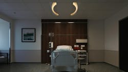 Focal Point's Saros Duo luminaire in evening setting. Focal Point's Saros Duo luminaire in evening setting.