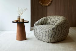 Luna Textiles Artifact textile from the Evoke Collection on a chair. Luna Textiles Artifact textile from the Evoke Collection on a chair.