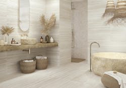 Grupo Halcon Ceramicas showed a mastery of neutral tile options at their primary stand and in their brand displays. The company also showcased the soothing and welcoming embrace of neutrals in a bath application image from the Emotion brand, where tiles in multiple sizes, orientations, and reliefs are incorporated to maintain the flow of the room while providing visual interest. Grupo Halcon Ceramicas showed a mastery of neutral tile options at their primary stand and in their brand displays. The company also showcased the soothing and welcoming embrace of neutrals in a bath application image from the Emotion brand, where tiles in multiple sizes, orientations, and reliefs are incorporated to maintain the flow of the room while providing visual interest.