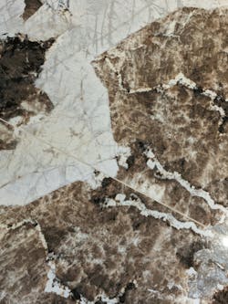 As seen at large-format porcelain slab manufacturer Venux, even up close, variations in shading, veining throughout, and details that shimmer like natural stone can deceive the discerning eye into seeing the beauty of marble replicated with the longevity and durability of tile. As seen at large-format porcelain slab manufacturer Venux, even up close, variations in shading, veining throughout, and details that shimmer like natural stone can deceive the discerning eye into seeing the beauty of marble replicated with the longevity and durability of tile.