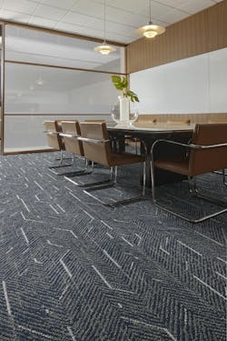 The Dressed Lines collection is shown in the navy colorway of the angular times pattern. The Dressed Lines collection is shown in the navy colorway of the angular times pattern.