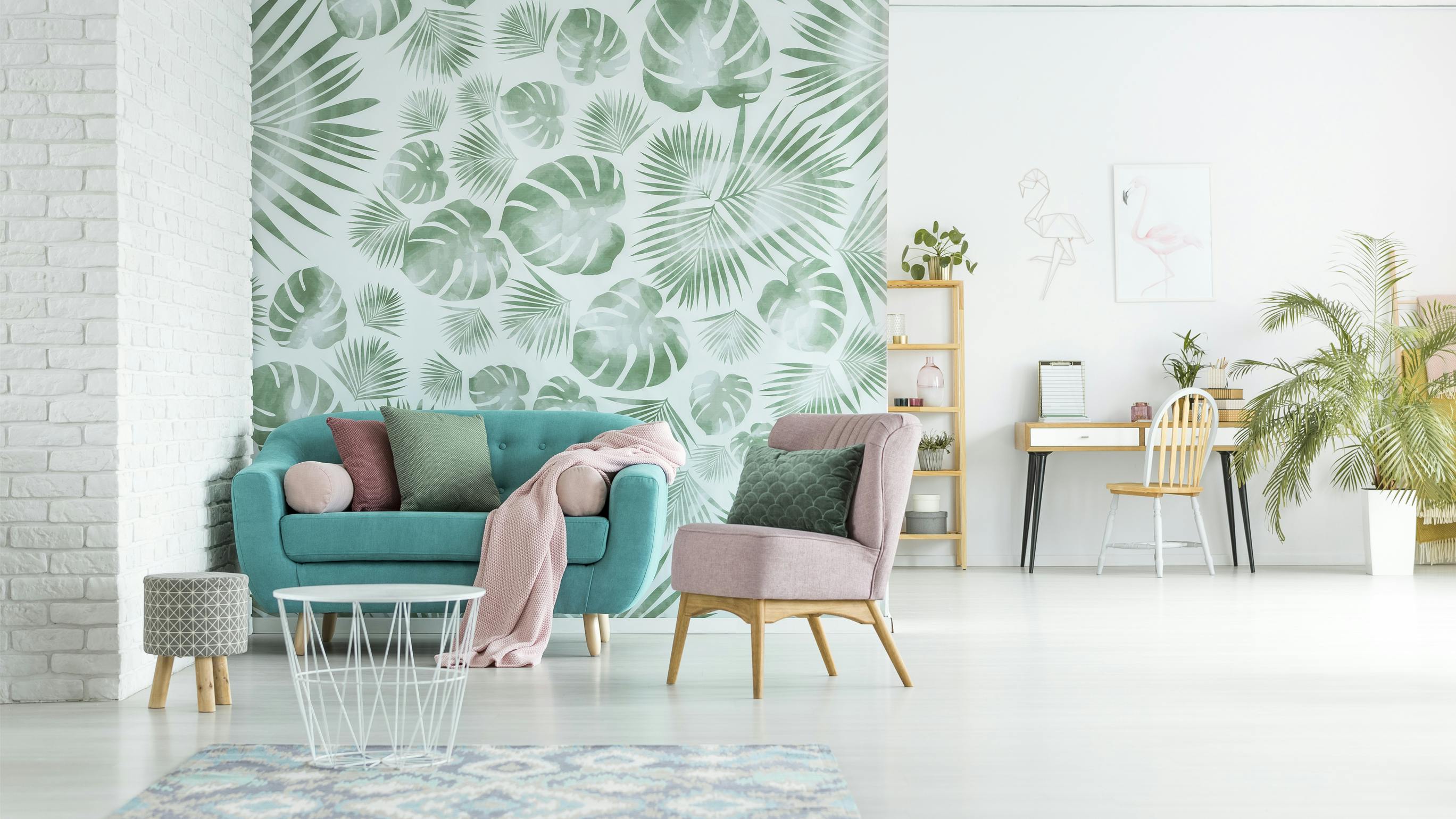 Botanical green leaf pattern wallcovering in a tranquil multiuse loft