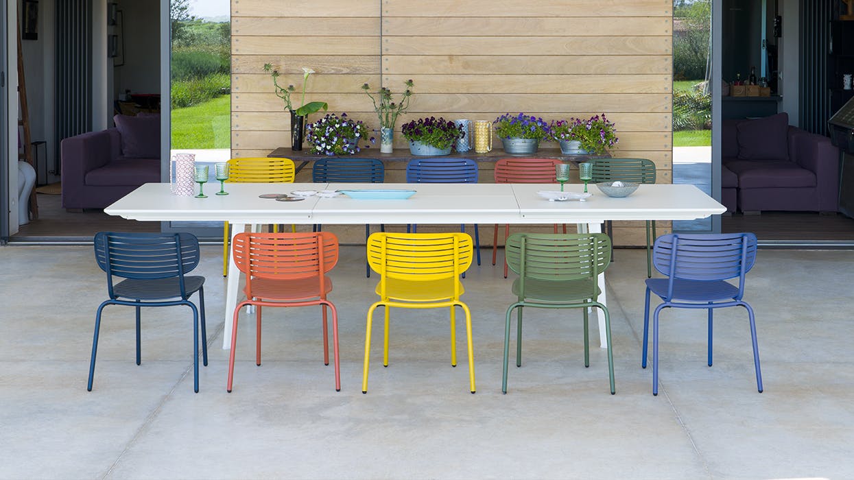 Mom collection has seating options for a dining space, shown in numerous vibrant colors.