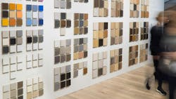 Multi-colored and textured laminate samples mounted on wall for trade show exhibit. Multi-colored and textured laminate samples mounted on wall for trade show exhibit.