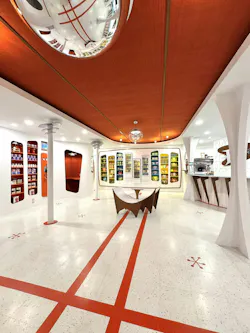 The 'retro-futuristic' vision for Panoramica Coffee Shop in Peconic, NY, injects the space-age aesthetic of the 1950s and 1960s with modern fixtures and surfaces that include a striking, customized vinyl composition tile (VCT) flooring design. The 'retro-futuristic' vision for Panoramica Coffee Shop in Peconic, NY, injects the space-age aesthetic of the 1950s and 1960s with modern fixtures and surfaces that include a striking, customized vinyl composition tile (VCT) flooring design.