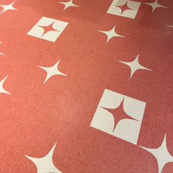 Close-up of custom-cut VCT flooring, designed by Ricky TeeVee, at The Times Vintage. Close-up of custom-cut VCT flooring, designed by Ricky TeeVee, at The Times Vintage.