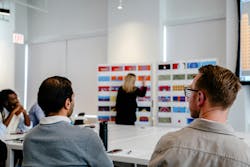 Perkins&Will employees brainstorm show for ART on THE MART in an office. Perkins&Will employees brainstorm show for ART on THE MART in an office.