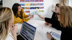 Perkins&Will employees designing a show for the 2025 ART on THE MART