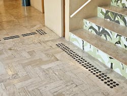 'Podotactile' surfaces with texture can help identify the transition from flat walkways to stairways. 'Podotactile' surfaces with texture can help identify the transition from flat walkways to stairways.