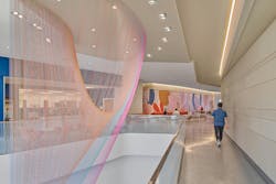 This ethereal hanging sculpture engages the senses from every angle. This ethereal hanging sculpture engages the senses from every angle.