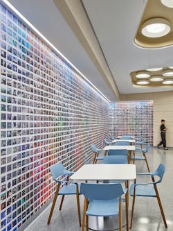 Thoughtful amenities like this café and its feature wall give patients spots of respite. Thoughtful amenities like this café and its feature wall give patients spots of respite.