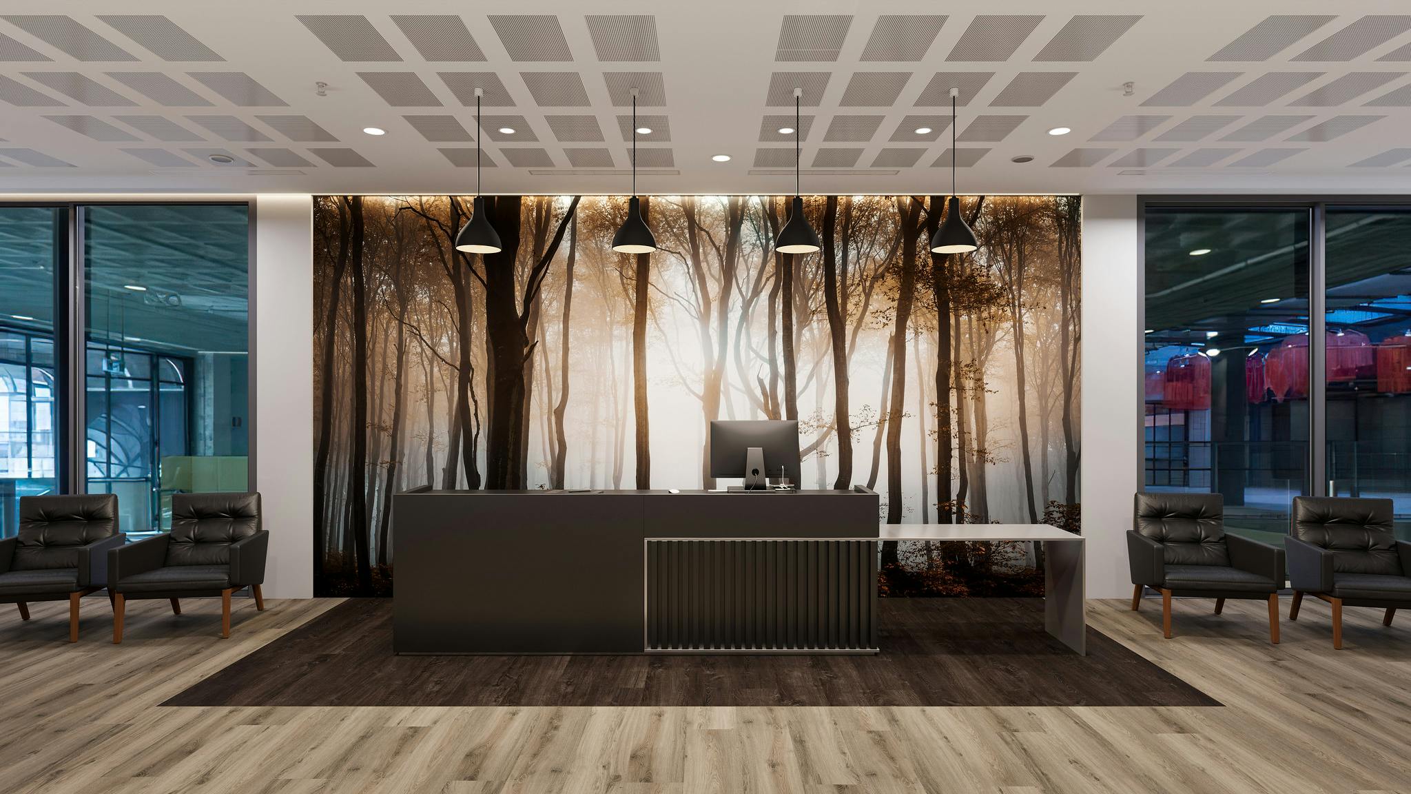 Reception desk with floor-to-ceiling wall panel featuring duotone forest graphic.