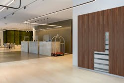 Cambio Tambour wall system - wood cladding on lobby walls Cambio Tambour wall system - wood cladding on lobby walls