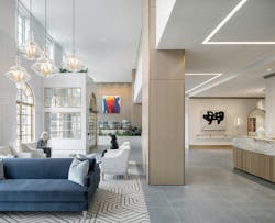 Inspir Embassy Row DC lobby with linear recessed lighting, contemporary pendant lighting, modern artwork, and neutral surfaces and finishes Inspir Embassy Row DC lobby with linear recessed lighting, contemporary pendant lighting, modern artwork, and neutral surfaces and finishes