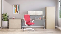 Modern task chair in red upholstery fabric in an office setting with light wood floors and furniture. Modern task chair in red upholstery fabric in an office setting with light wood floors and furniture.