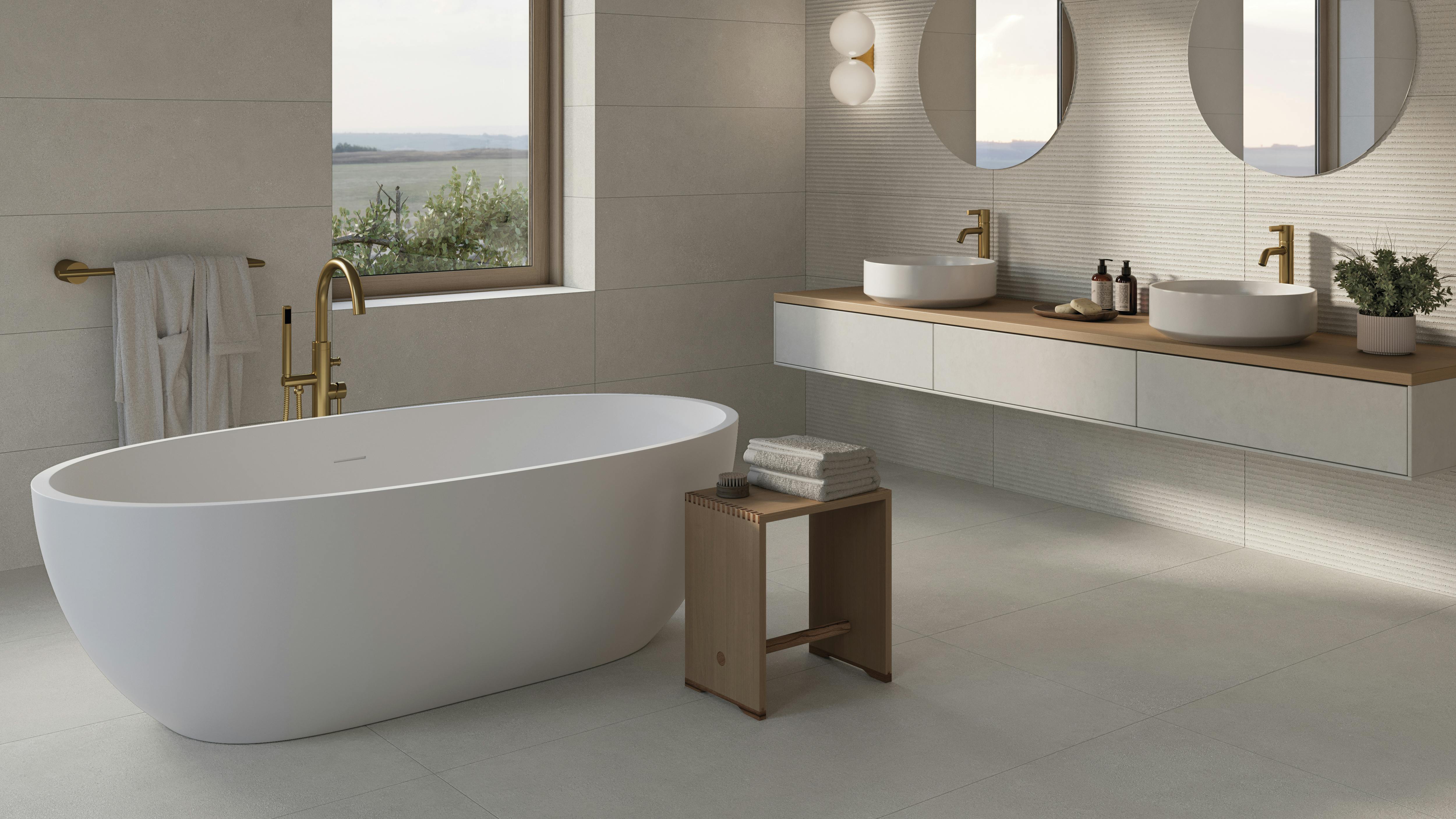 The LEVEL collection offers flooring colors for indoor and outdoor use, wall tile slabs, and ceramic slabs. Shown in a bathroom installation.