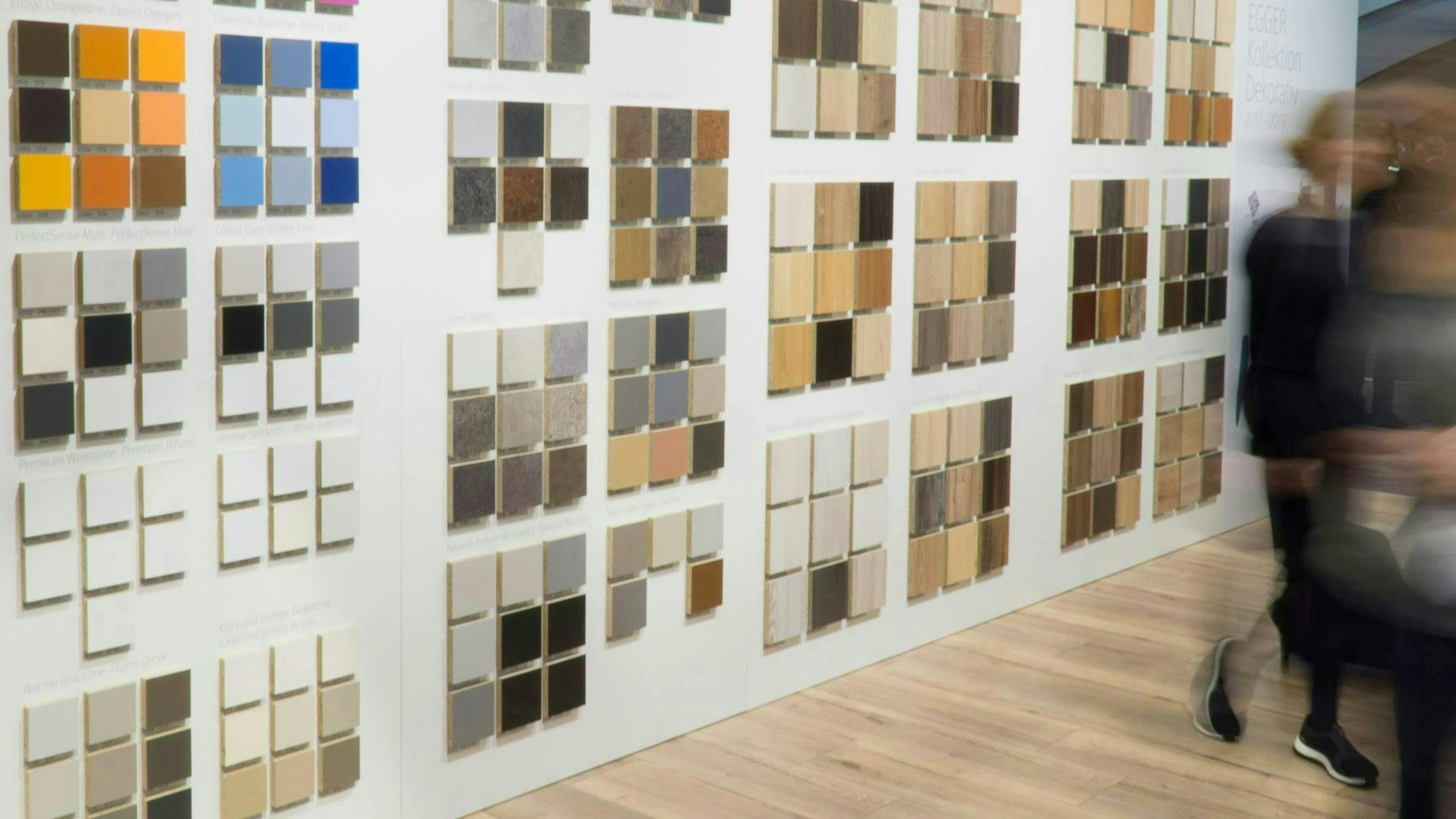 Multi-colored and textured laminate samples mounted on wall for trade show exhibit. Multi-colored and textured laminate samples mounted on wall for trade show exhibit.