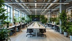 A biophilic office space with central conference area and individual workstations, with an industrial aesthetic softened by many indoor plants. A biophilic office space with central conference area and individual workstations, with an industrial aesthetic softened by many indoor plants.