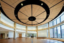 Light, warm Lyra PB Wood Look ceiling panels provide the natural beauty of wood while absorbing 95 percent of the noise in the spacious, window-filled rotunda of the Minneapolis American Indian Center (MAIC). Light, warm Lyra PB Wood Look ceiling panels provide the natural beauty of wood while absorbing 95 percent of the noise in the spacious, window-filled rotunda of the Minneapolis American Indian Center (MAIC).