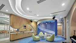 A white Acoustibuilt Seamless Acoustical Ceiling System reduces noise and speech intelligibility for privacy, while curves echoed throughout the space impart movement and progress at Children's Hospital in Memphis, Tennessee. A white Acoustibuilt Seamless Acoustical Ceiling System reduces noise and speech intelligibility for privacy, while curves echoed throughout the space impart movement and progress at Children's Hospital in Memphis, Tennessee.