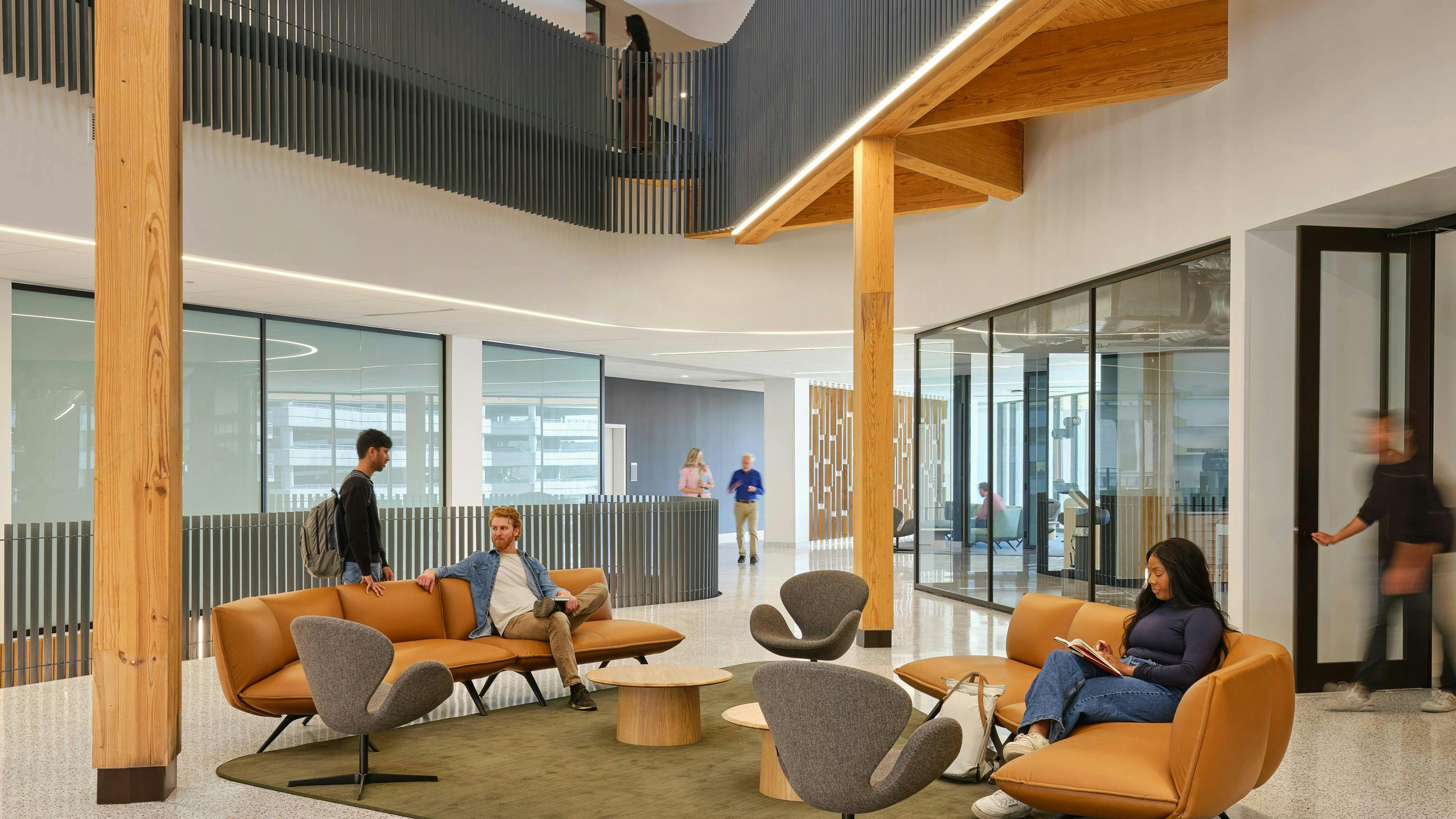 University of Arkansas I3R building atrium features a soaring mass timber canopy, steel laboratory corridor, and plenty of collaborative spaces.