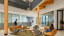 University of Arkansas I3R building atrium features a soaring mass timber canopy, steel laboratory corridor, and plenty of collaborative spaces.