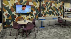 HON exhibit features a sample staff amenity space with wallcovering and chairs in desaturated colors. HON exhibit features a sample staff amenity space with wallcovering and chairs in desaturated colors.