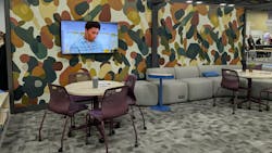 HON exhibit features a sample staff amenity space with wallcovering and chairs in desaturated colors. HON exhibit features a sample staff amenity space with wallcovering and chairs in desaturated colors.