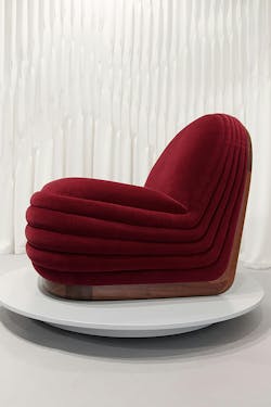 The Pulse armchair blends pleating and rich velvet upholstery for a comfortable lounge piece. The Pulse armchair blends pleating and rich velvet upholstery for a comfortable lounge piece.