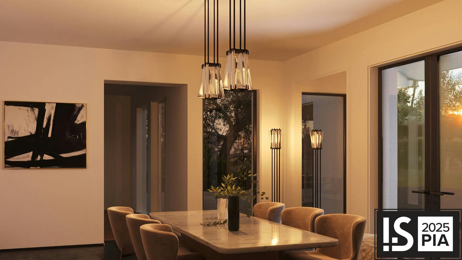 Two AVANT Pendants suspended over a dining table.