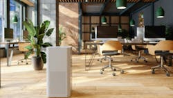 Air purifier on floor of contemporary office with wood floors, natural light and plants. Air purifier on floor of contemporary office with wood floors, natural light and plants.
