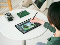 A person sketches an outdoor image on the MovinkPad 11. A person sketches an outdoor image on the MovinkPad 11.